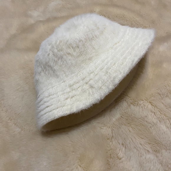 white fuzzy hat